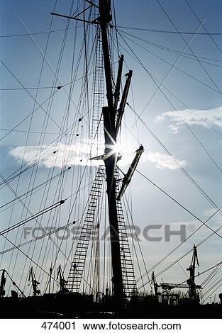 Ship's mast and rigging in silhouette View Large Photo Image Stock Image - Ship's mast and rigging in silhouette. Fotosearch