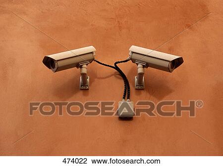 Surveillance cameras on a wall View Large Photo Image Stock Image - Surveillance cameras on a wall. Fotosearch