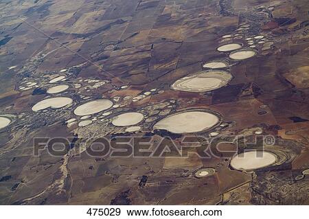 Aerial view of salt lakes View Large Photo Image Stock Photo - Aerial view of salt lakes. Fotosearch