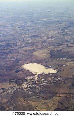 Stock Image - Aerial view of salt lakes within a rural landscape. Fotosearch