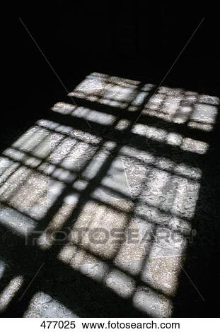 Shadow of bars on a tiled floor View Large Photo Image Stock Photography - Shadow of bars on a tiled floor. Fotosearch