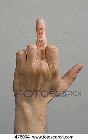 A man with a rubber stamp on his middle finger making an obscene hand gesture View Large Photo Image Picture - A man with a rubber stamp on his middle finger making an obscene hand gesture. Fotosearch