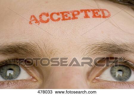 A man with 'Accepted' stamped on his forehead View Large Photo Image Stock Image - A man with 'Accepted' stamped on his forehead. Fotosearch