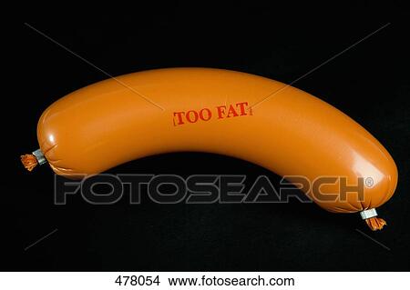 A sausage wrapped in plastic packaging and stamped 'Too Fat' View Large Photo Image Picture - A sausage wrapped in plastic packaging and stamped 'Too Fat'. Fotosearch