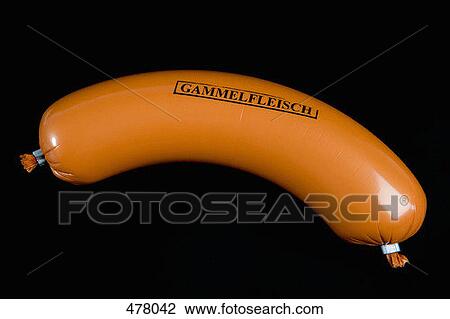 A sausage wrapped in plastic packaging and stamped 'Rotten Meat' View Large Photo Image Stock Image - A sausage wrapped in plastic packaging and stamped 'Rotten Meat'. Fotosearch
