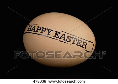 An egg stamped 'Happy Easter' View Large Photo Image Stock Photo - An egg stamped 'Happy Easter'. Fotosearch