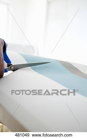 Cutting wallpaper View Large Photo Image Stock Photo - Cutting wallpaper. Fotosearch