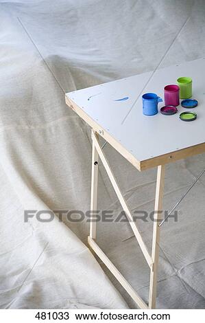 Paint tins on a decorating table View Large Photo Image Stock Image - Paint tins on a decorating table. Fotosearch