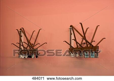 Coat racks and tags at a cloakroom View Large Photo Image Stock Image - Coat racks and tags at a cloakroom. Fotosearch
