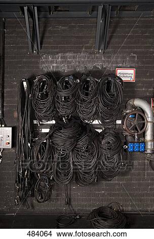 Electrical cables hanging on a wall backstage in a theater View Large Photo Image Picture - Electrical cables hanging on a wall backstage in a theater. Fotosearch