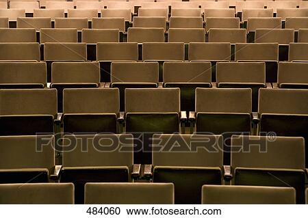 Rows of empty seating in an auditorium View Large Photo Image Stock Image - Rows of empty seating in an auditorium. Fotosearch