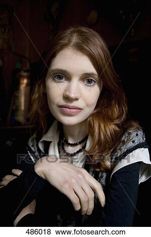 Stock Photo - A portrait of a young woman. Fotosearch