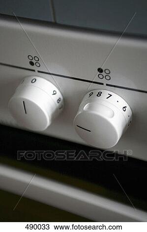 Knobs on a stove View Large Photo Image Stock Image - Knobs on a stove. Fotosearch