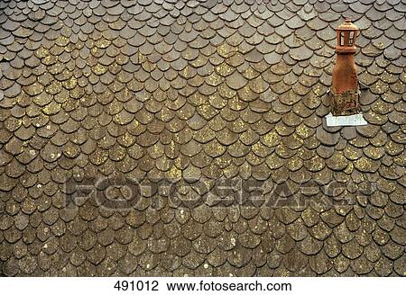 Detail of a roof top and chimney View Large Photo Image Stock Image - Detail of a roof top and chimney. Fotosearch