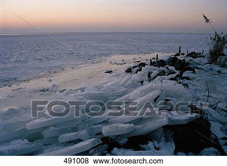 Ice on a shoreline View Large Photo Image Stock Photo - Ice on a shoreline. Fotosearch