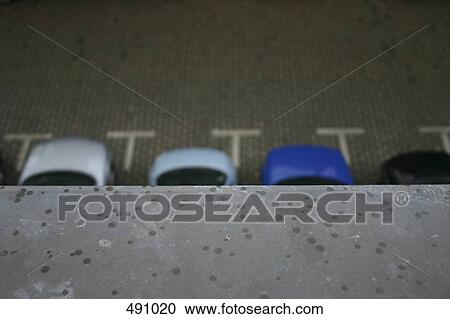 Raindrops on a window ledge above a car park View Large Photo Image Stock Image - Raindrops on a window ledge above a car park. Fotosearch