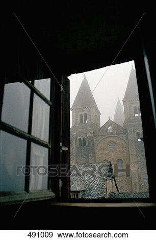 Stock Photo - View of a church through a window. Fotosearch