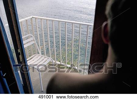 View over a man's shoulder looking to the sea View Large Photo Image Stock Image - View over a man's shoulder looking to the sea. Fotosearch