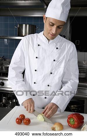 A chef preparing vegetables View Large Photo Image Stock Image - A chef preparing vegetables. Fotosearch
