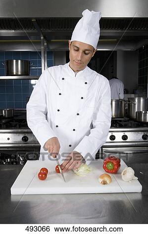 A chef preparing vegetables View Large Photo Image Stock Photograph - A chef preparing vegetables. Fotosearch