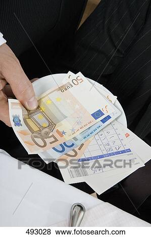 Paying the bill View Large Photo Image Stock Photo - Paying the bill. Fotosearch