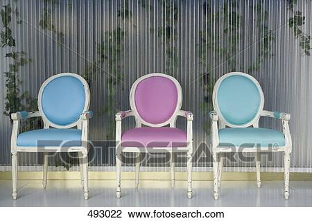 Three chairs in a row View Large Photo Image Stock Image - Three chairs in a row. Fotosearch