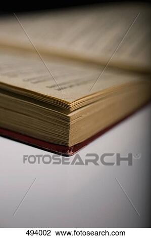 Detail of an open book View Large Photo Image Stock Image - Detail of an open book. Fotosearch