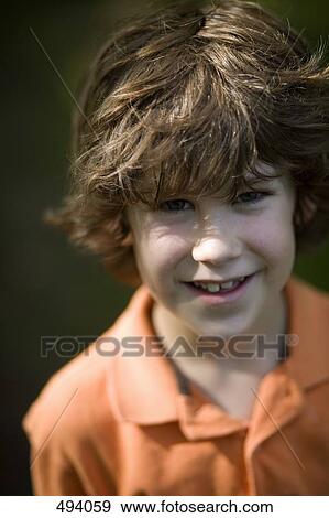 Portrait of a young boy with red hair View Large Photo Image Stock Photo - Portrait of a young boy with red hair. Fotosearch