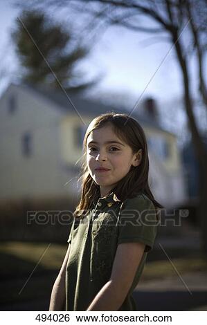 Portrait of a young girl View Large Photo Image Stock Photograph - Portrait of a young girl. Fotosearch