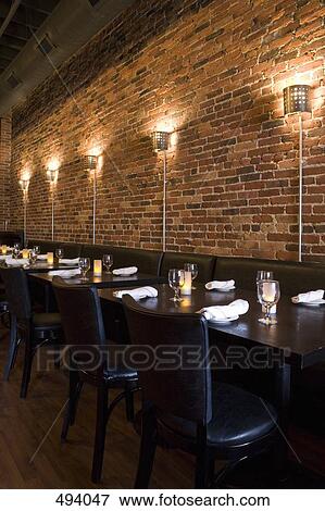 Table settings in a restaurant View Large Photo Image Stock Photo - Table settings in a restaurant. Fotosearch