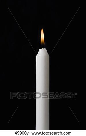 A burning candle View Large Photo Image Stock Photo - A burning candle. Fotosearch