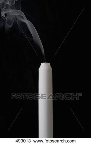 An extinguished candle View Large Photo Image Stock Image - An extinguished candle. Fotosearch