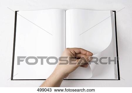 Detail of a man turning a page of a blank book View Large Photo Image Stock Image - Detail of a man turning a page of a blank book. Fotosearch