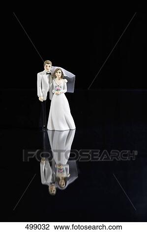 Figurine of a bride and groom View Large Photo Image Stock Image - Figurine of a bride and groom. Fotosearch