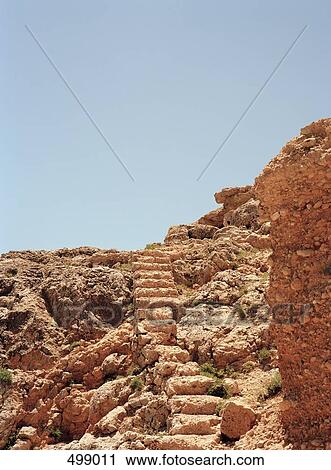 Stock Image - Steps on a rocky hill. Fotosearch
