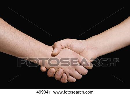 Two men shaking hands View Large Photo Image Stock Image - Two men shaking hands. Fotosearch
