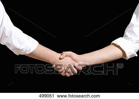 Two men shaking hands View Large Photo Image Stock Image - Two men shaking hands. Fotosearch