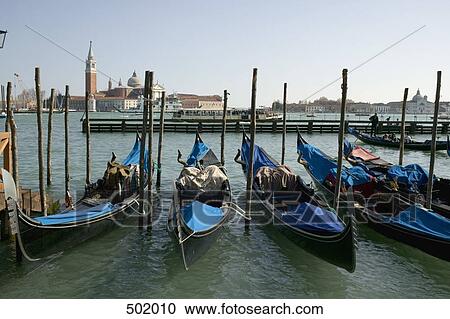 Gondolas moored in Venice View Large Photo Image Stock Image - Gondolas moored in Venice. Fotosearch