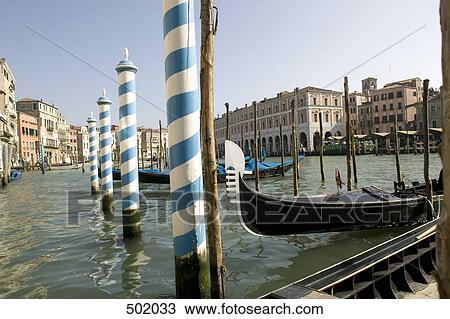 Gondolas moored in Venice View Large Photo Image Stock Image - Gondolas moored in Venice. Fotosearch