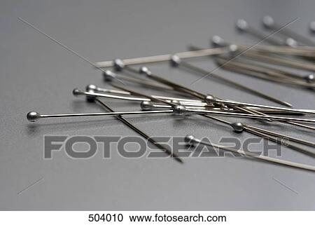 Detail of a pile of silver pins View Large Photo Image Stock Image - Detail of a pile of silver pins. Fotosearch