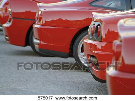 A row of new red cars View Large Photo Image Stock Photo - A row of new red cars. Fotosearch