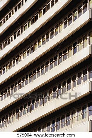 Picture - Rows of balconies and windows. Fotosearch