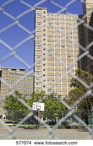 Picture - An empty outdoor city basketball court. Fotosearch