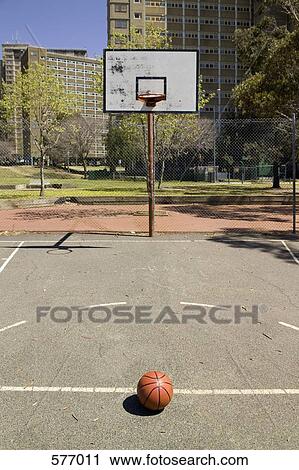 Empty outdoor basketball court and a basketball View Large Photo Image Stock Image - Empty outdoor basketball court and a basketball. Fotosearch