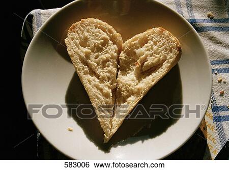 Bread shaped into a heart View Large Photo Image Stock Photograph - Bread shaped into a heart. Fotosearch