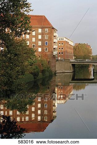 Germany, Hamburg, Reflection of buildings in river View Large Photo Image Stock Photograph - Germany, Hamburg, Reflection of buildings in river. Fotosearch