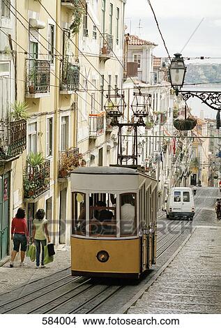 A tram on a street in Lisbon, Portugal View Large Photo Image Picture - A tram on a street in Lisbon, Portugal. Fotosearch