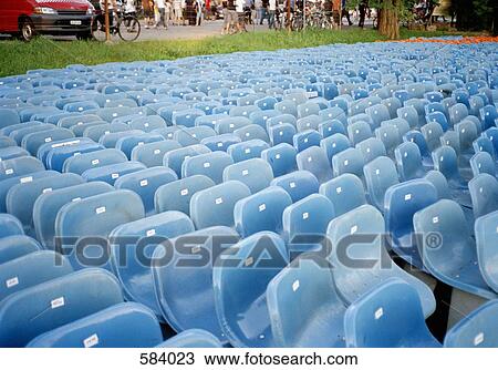 Stacked blue chairs View Large Photo Image Stock Image - Stacked blue chairs. Fotosearch