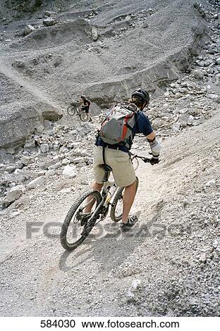 Two mountain bikers View Large Photo Image Stock Image - Two mountain bikers. Fotosearch