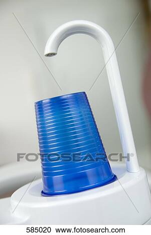Dental Cuspidor and empty plastic drinking cup View Large Photo Image Stock Image - Dental Cuspidor and empty plastic drinking cup. Fotosearch